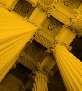 Upwards photo of bank or finance building columns