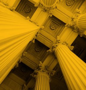 Upwards photo of bank or finance building columns