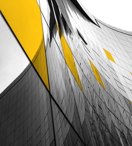 Sideways view of glass corporate building