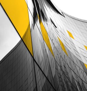 Sideways view of glass corporate building