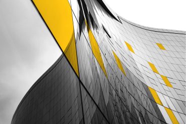 Sideways view of glass corporate building
