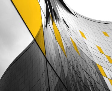 Sideways view of glass corporate building
