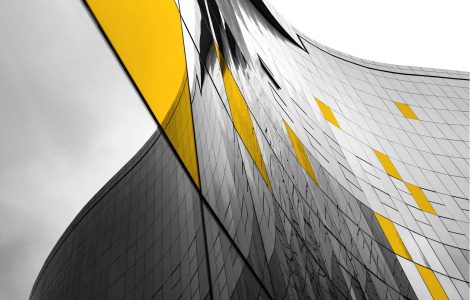 Sideways view of glass corporate building